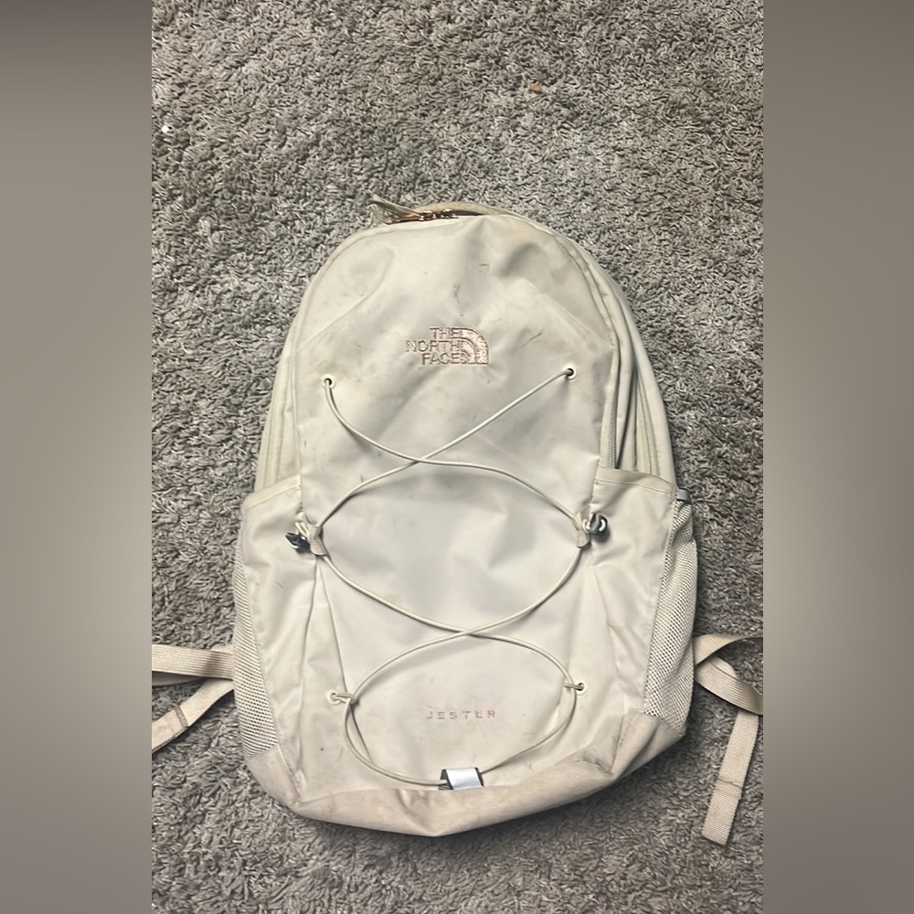 Cream north face backpack